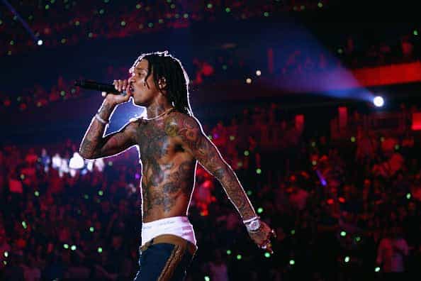 Swae Lee performing on stage.