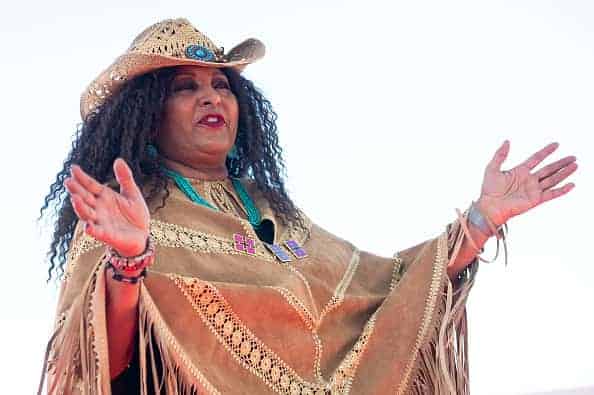 Pam Grier in Cowboy hat and shawl