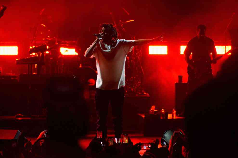 J. Cole performing