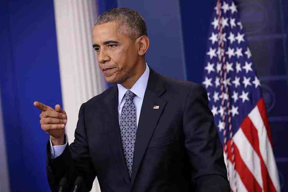 President Obama pointing while at podium