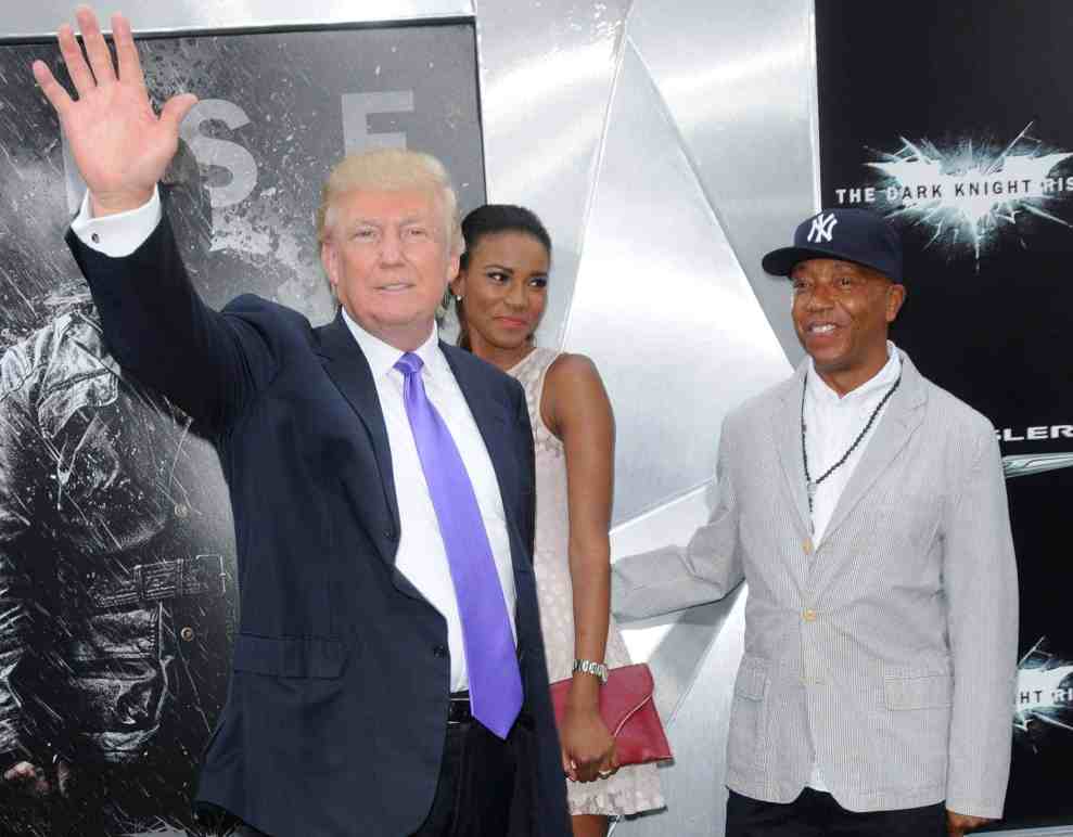 Donald Trump with Kimora Lee and Russell Simmons at the Dark Night premiere