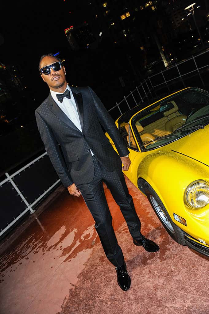Future in front of yellow sports car