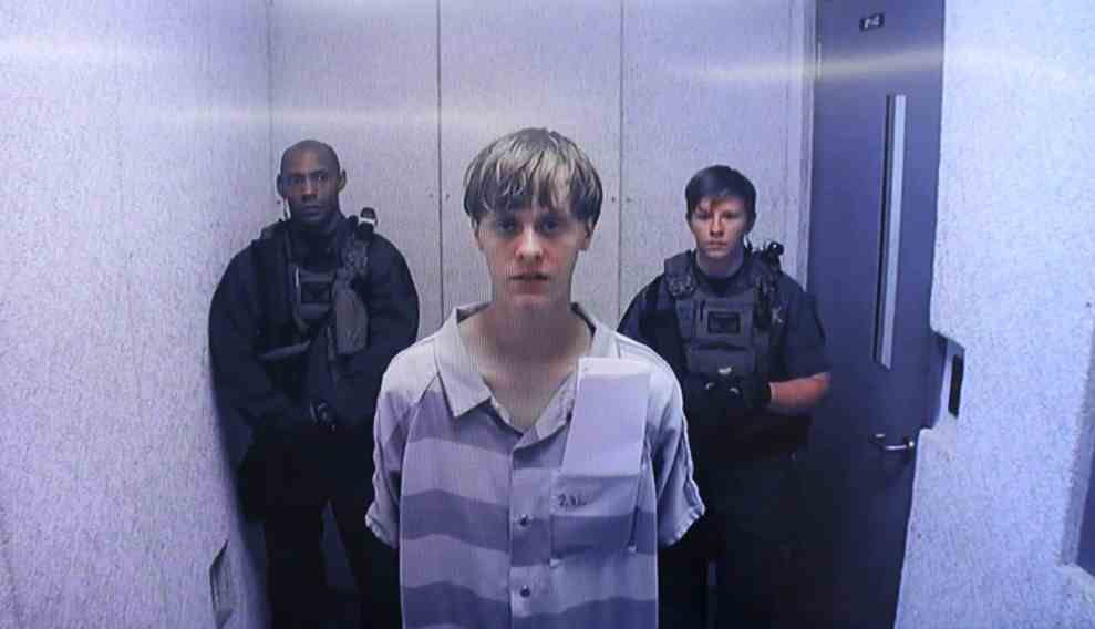 Dylann Roof in striped prison jumpsuit