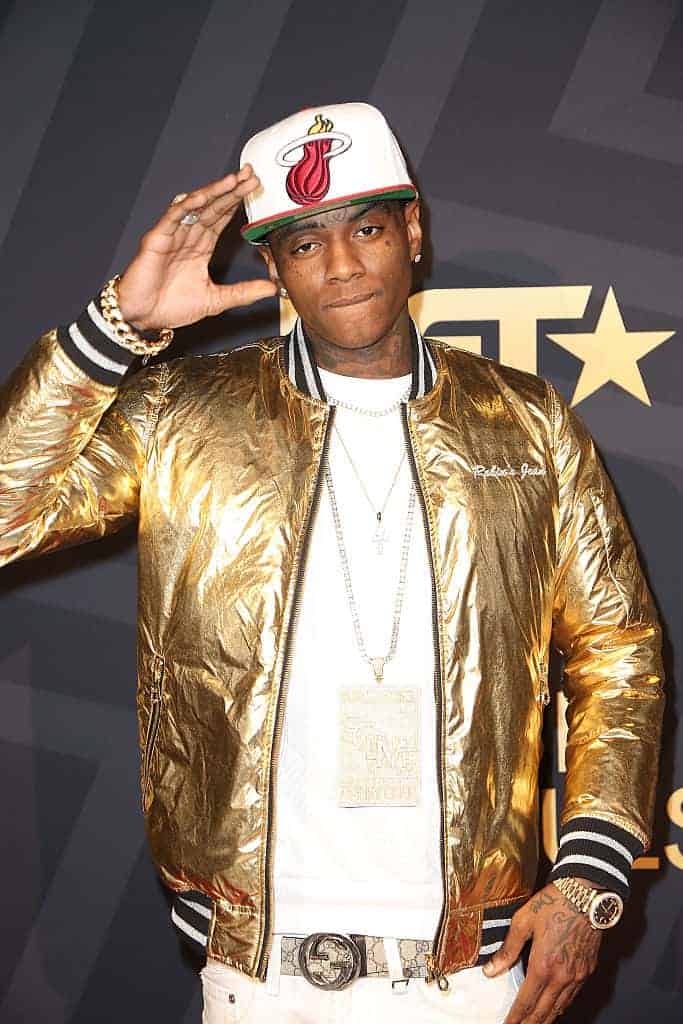 Soulja Boy in front of BET background