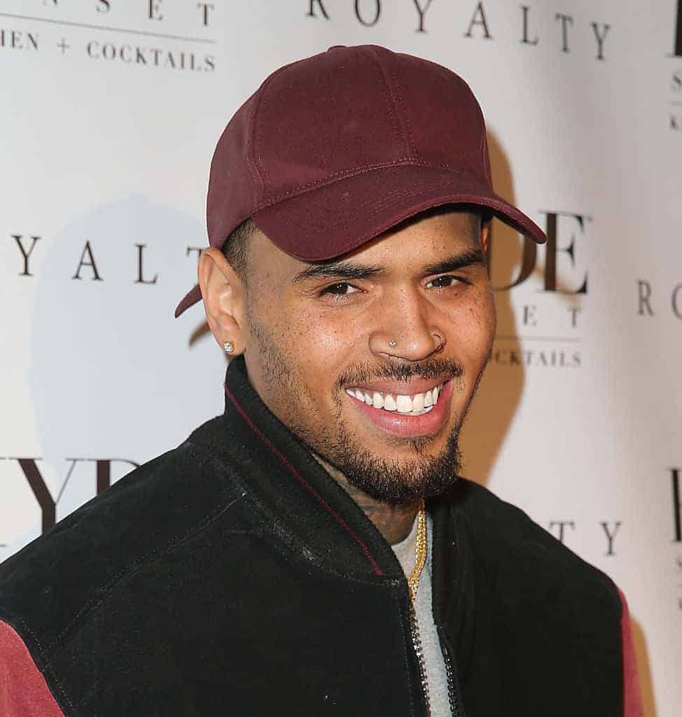 Chris Brown in front of Royalty background