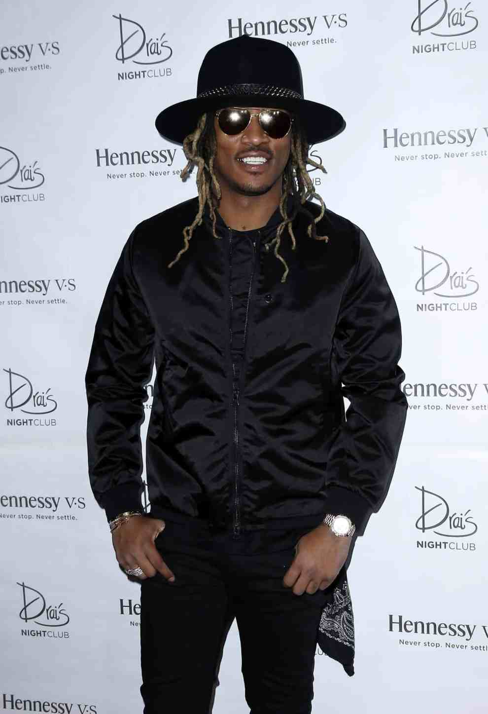 Future in front of background of Drai's Night Club and Hennessy V.S.