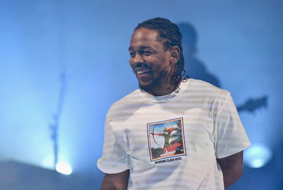 Kendrick Lamar on stage in Disney Robin Hood T-shirt