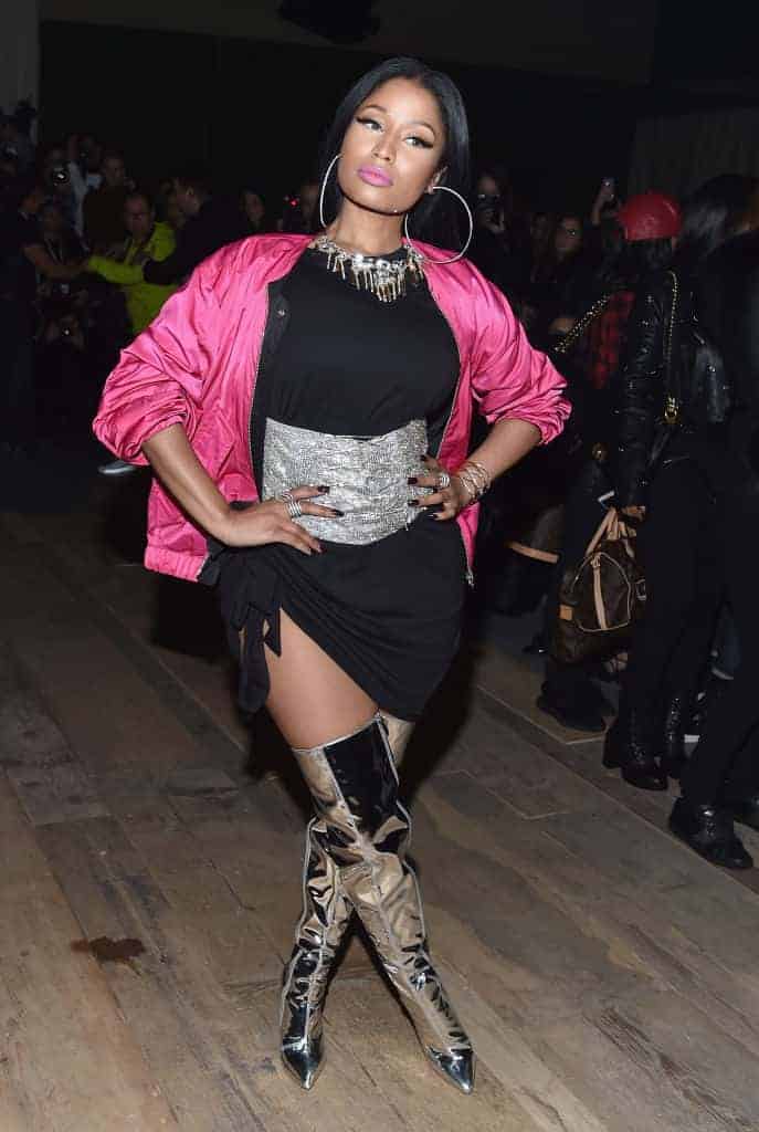 Nicki Minaj at event in black dress and hot pink shawl