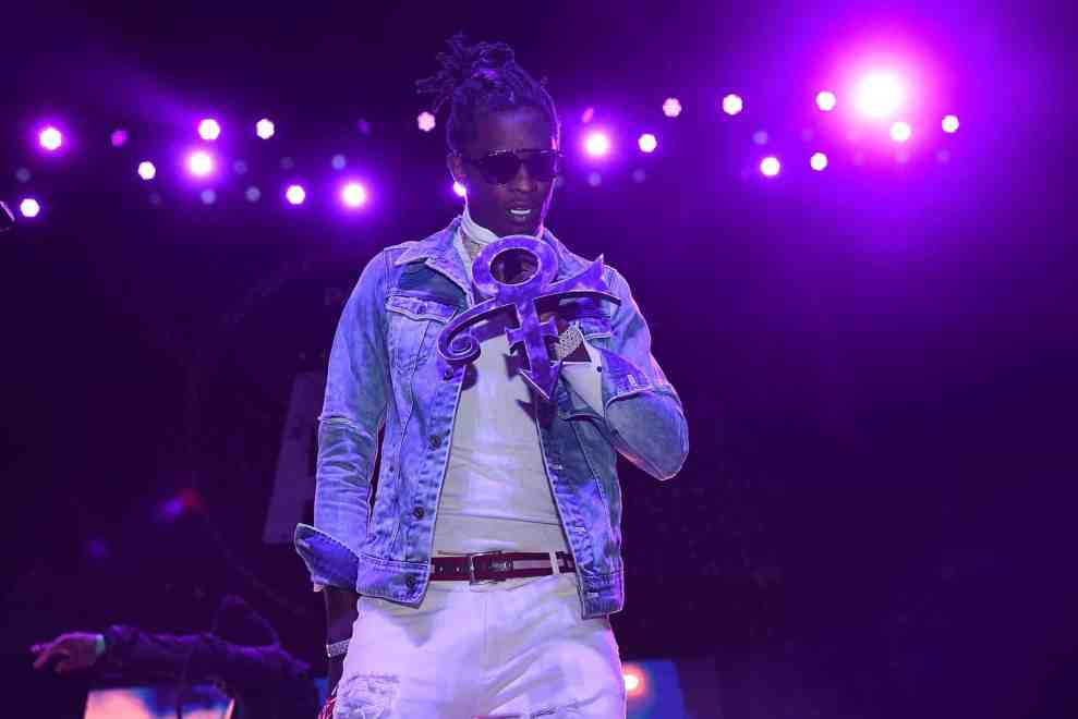 Young Thug performing with Prince symbol microphone