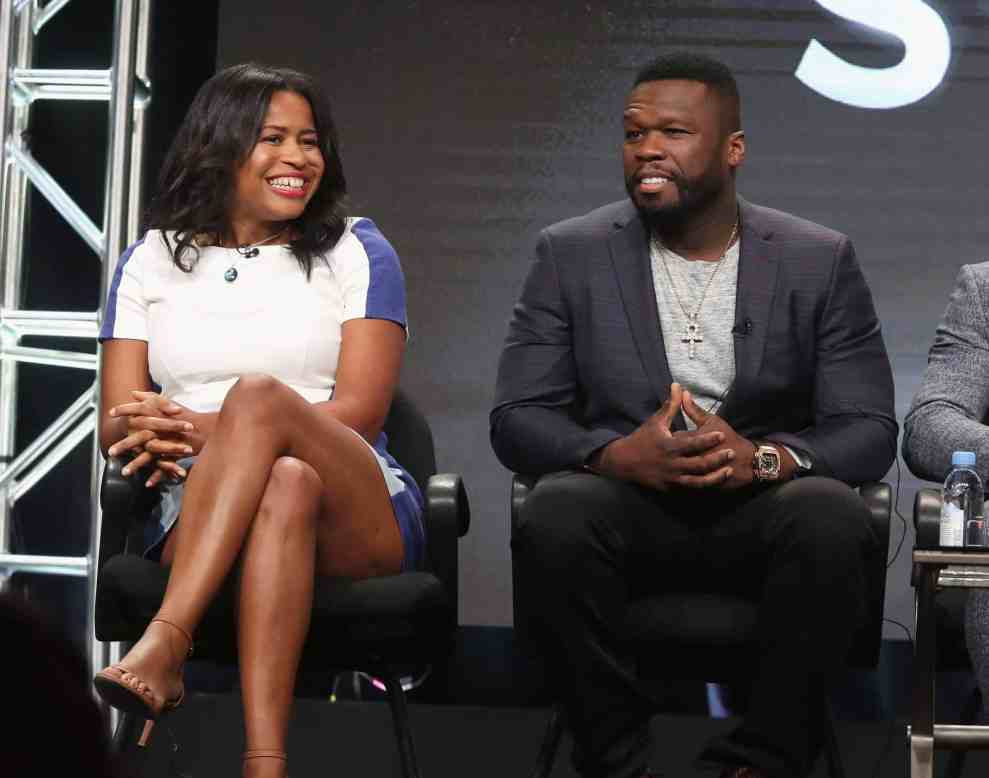 Courtney Kemp and 50 Cent on stage at STARZ Power event