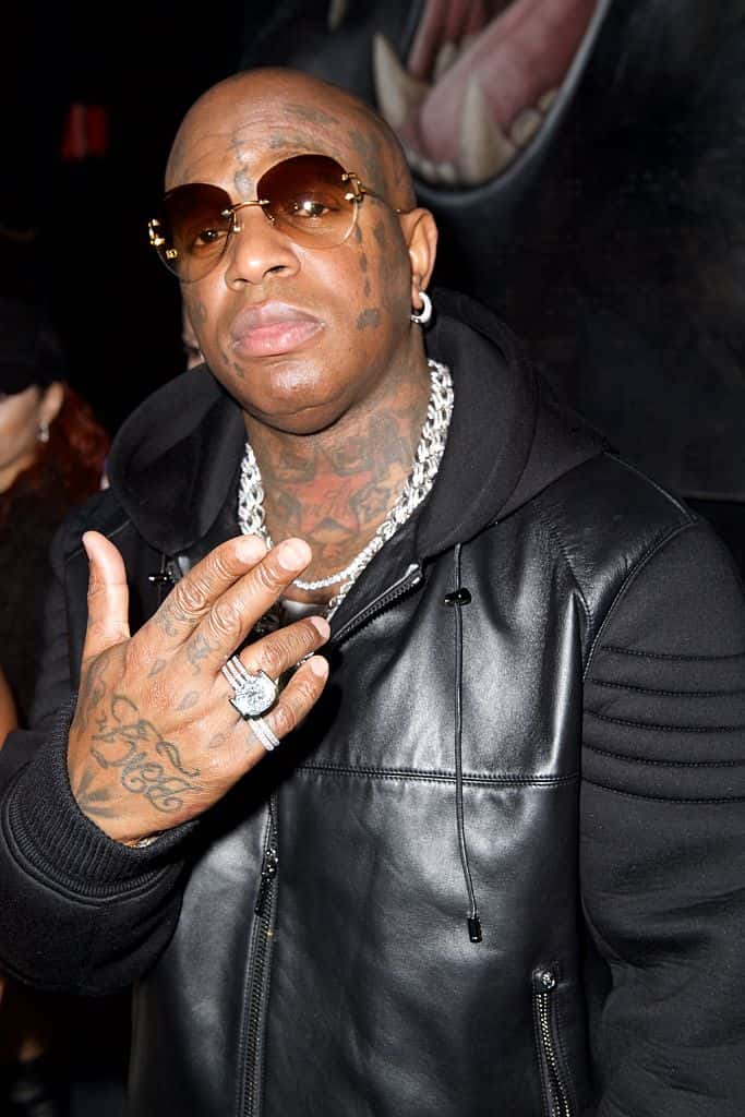 Birdman in silver chain and leather jacket
