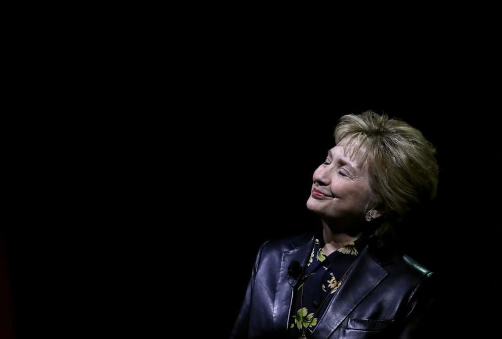 Hillary Clinton in front of black background