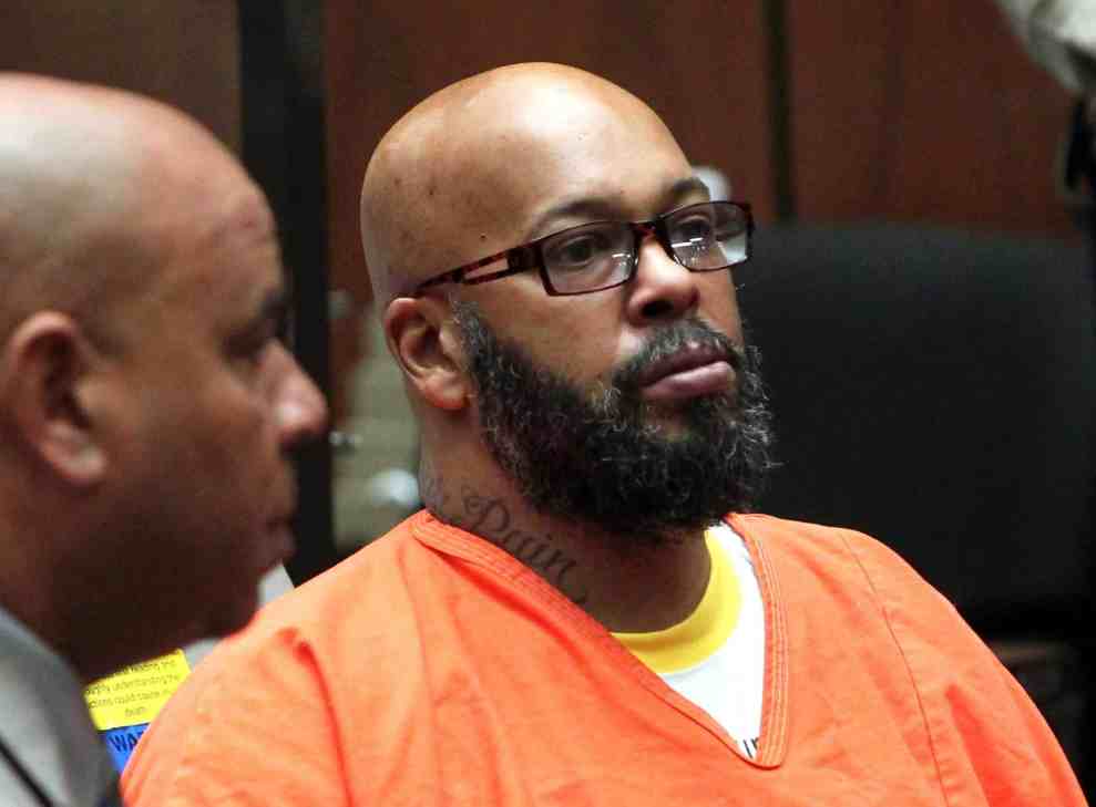 Suge Knight in orange jumpsuit in court
