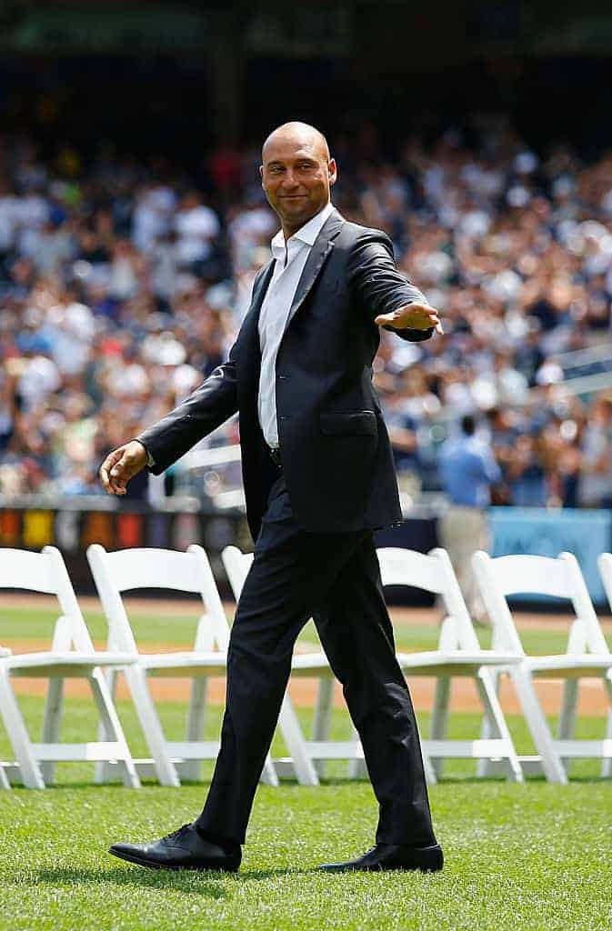 Derek Jetter in suit being honored at Yankee Stad