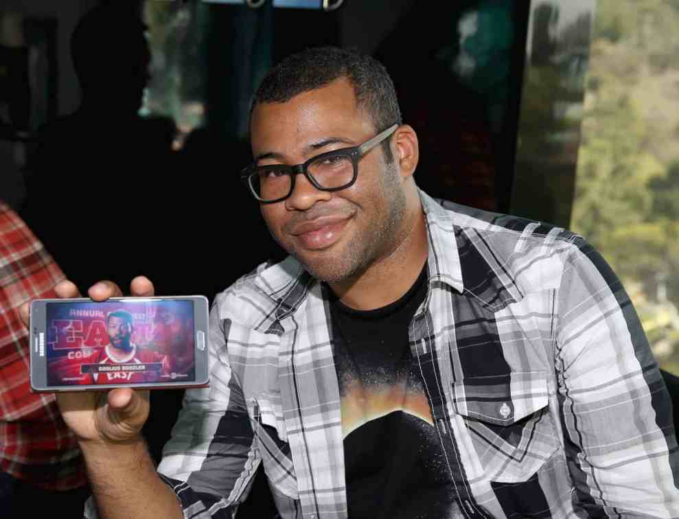 Jordyn Peele showing phone screen with Goolius Boozler