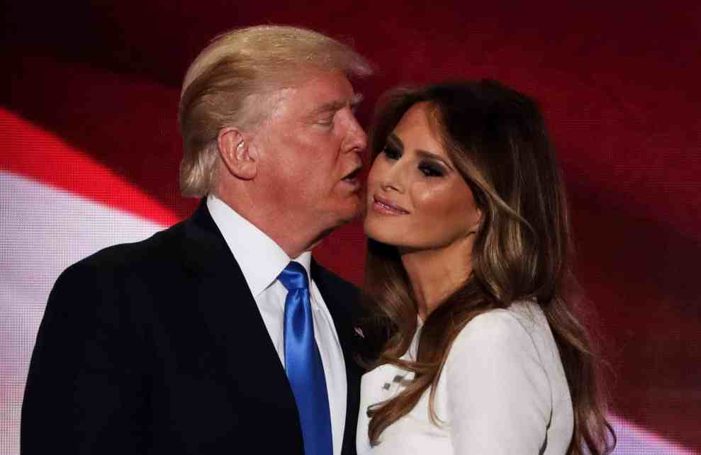 Donald Trump kissing Melania Trump on the cheek