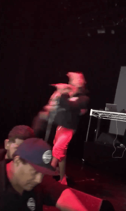 Screenshot from video of XXXTentacion getting knocked out on stage