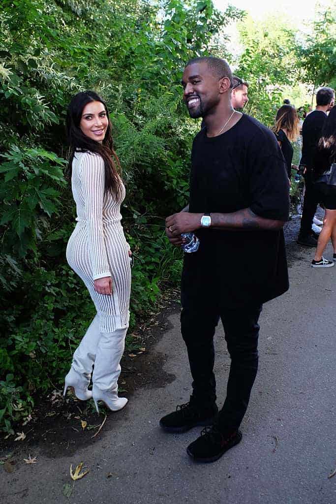 Kim Kardashian and Kanye West at Kanye West Yeezy Season 4 fashion show on September 7