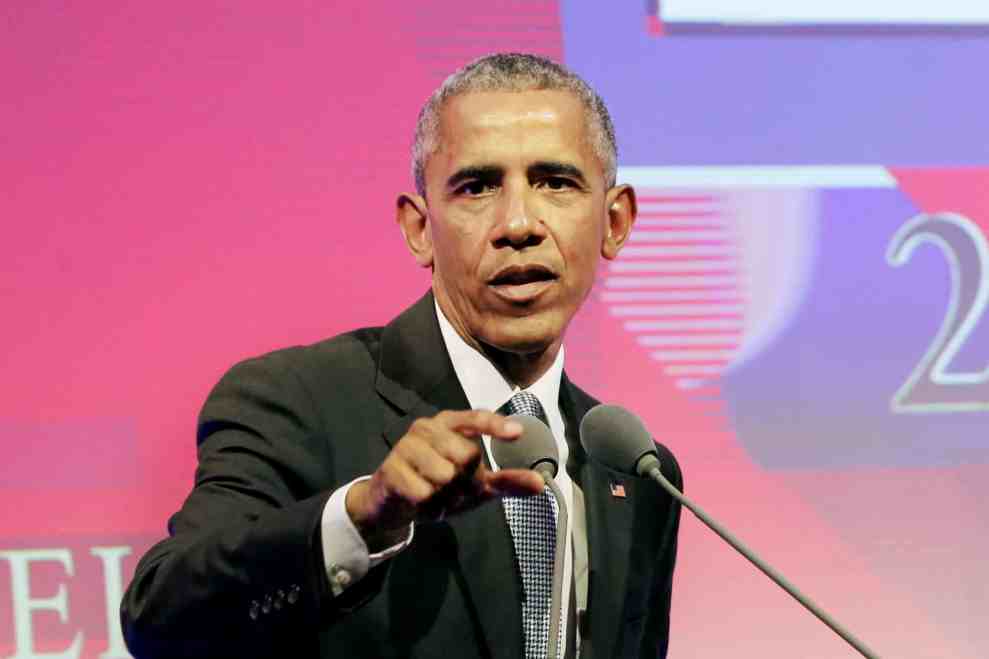 Barack Obama at event pointing at audience