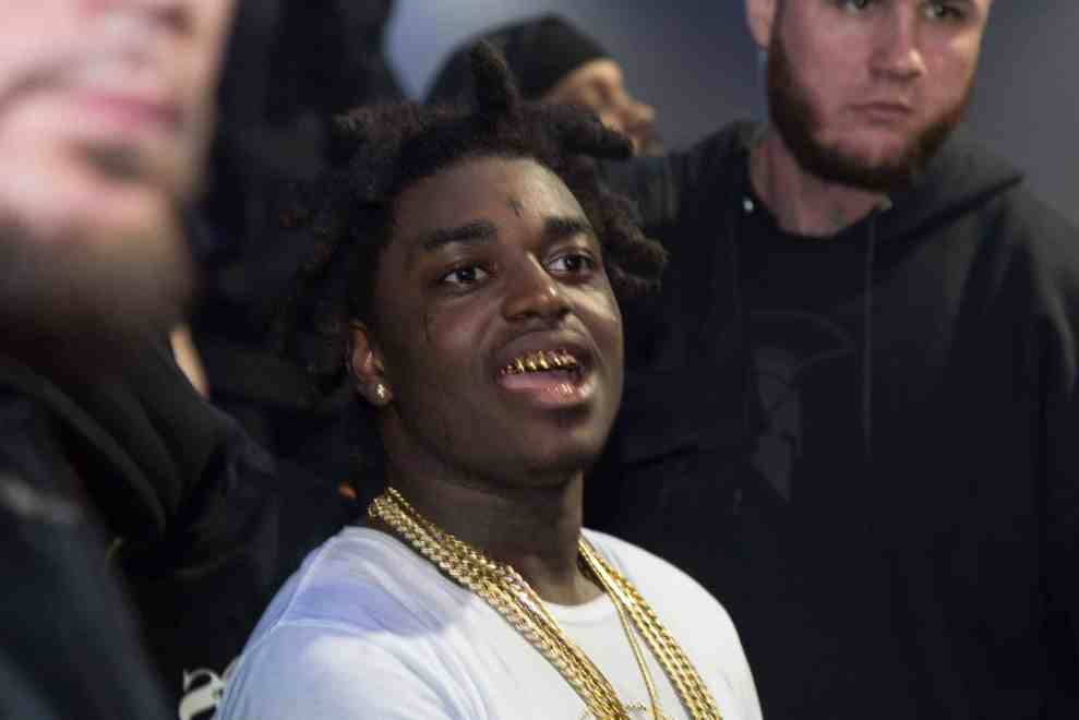 Kodak Black with gold teeth