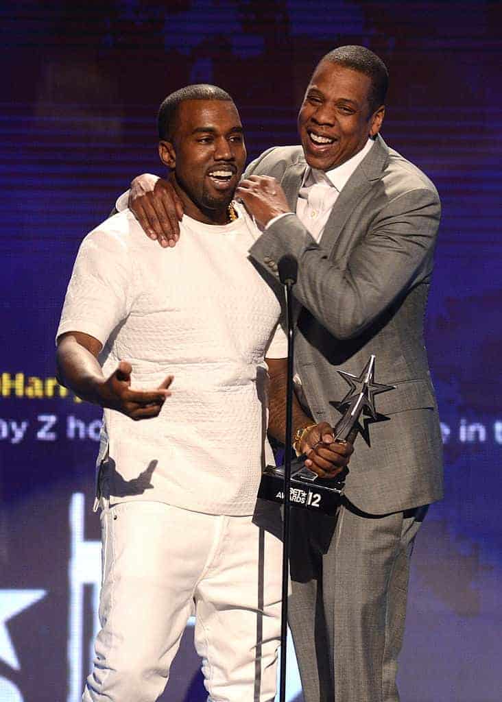Kanye and Jay Z accepting the Best Group Award onstage during the 2012 BET Awards