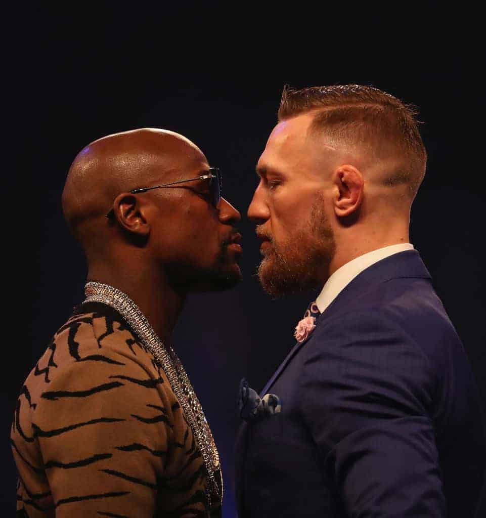 Floyd Mayweather Jr. and Conor McGregor come face to face during the Mayweather v McGregor World Press Tour SSE Arena July 2017