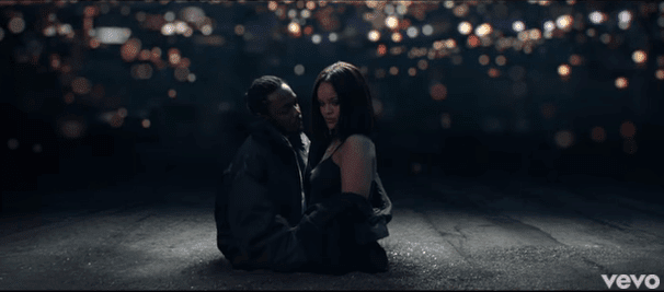 Screenshot from video 'Loyalty' of Kendrick Lamar and Rihanna sitting together