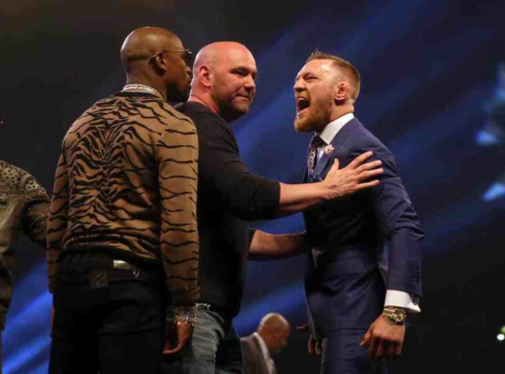 Floyd Mayweather Jr. and Conor McGregor come face to face during the World Press Tour SSE Arena July 2017