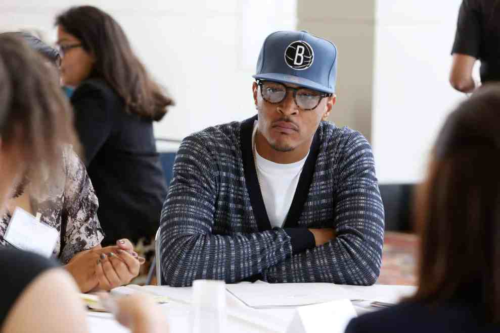 T.I. peaks with youths at a roundtable discussion at Opportunity Fair and Forum on August 13