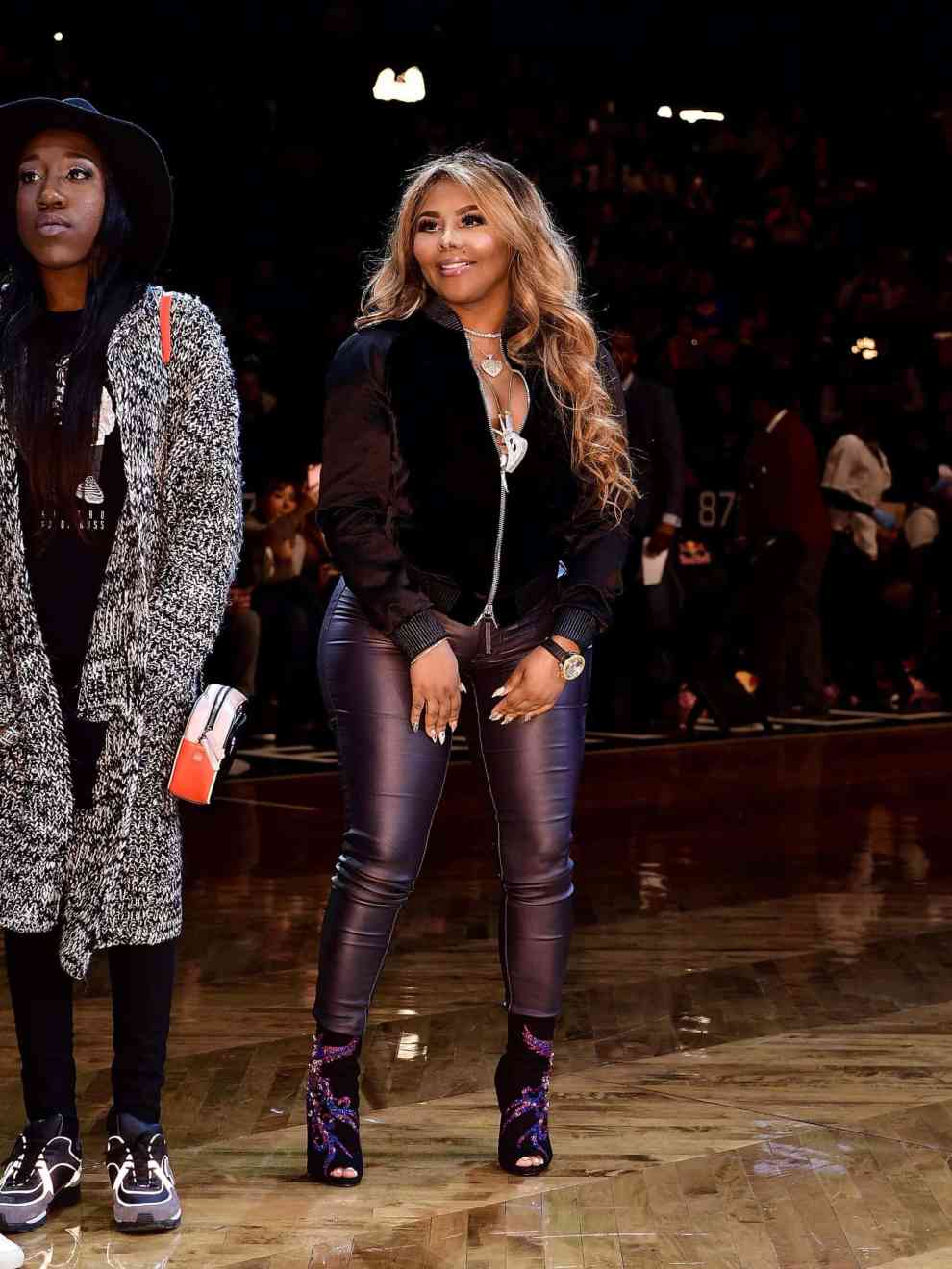 Lil' Kim attends New York Knicks Vs. Brooklyn Nets game at Barclays Center on March 12