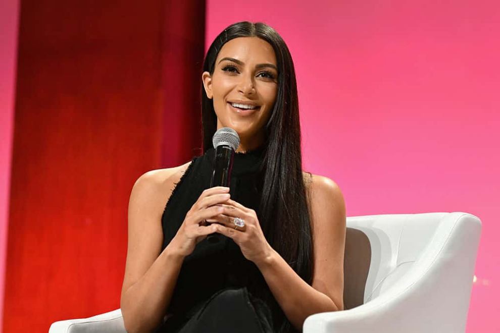 Kim Kardashian speaks at The Girls' Lounge dinner