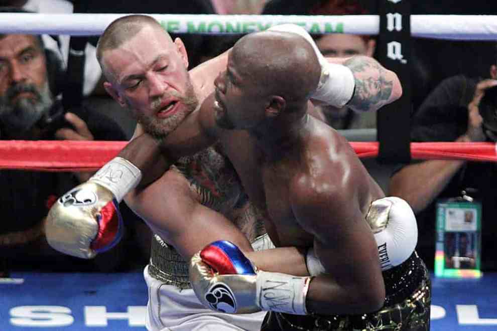 Connor McGregor and Floyd Mayweather during their fight at the T-Mobile Arena in Las Vegas