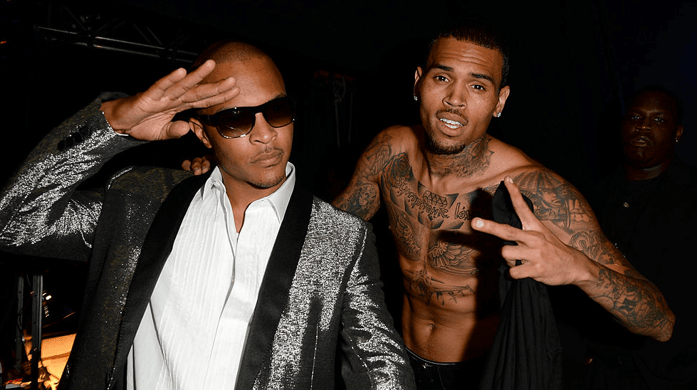 T.I. and Chris Brown pose backstage during the 2013 BET Awards
