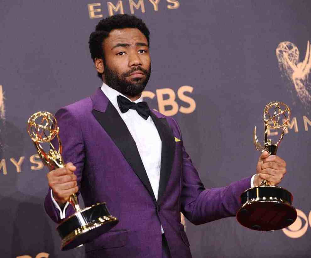 Donald Glover poses at the 69th Annual Primetime Emmy Awards - Press Room with 2 Emmys