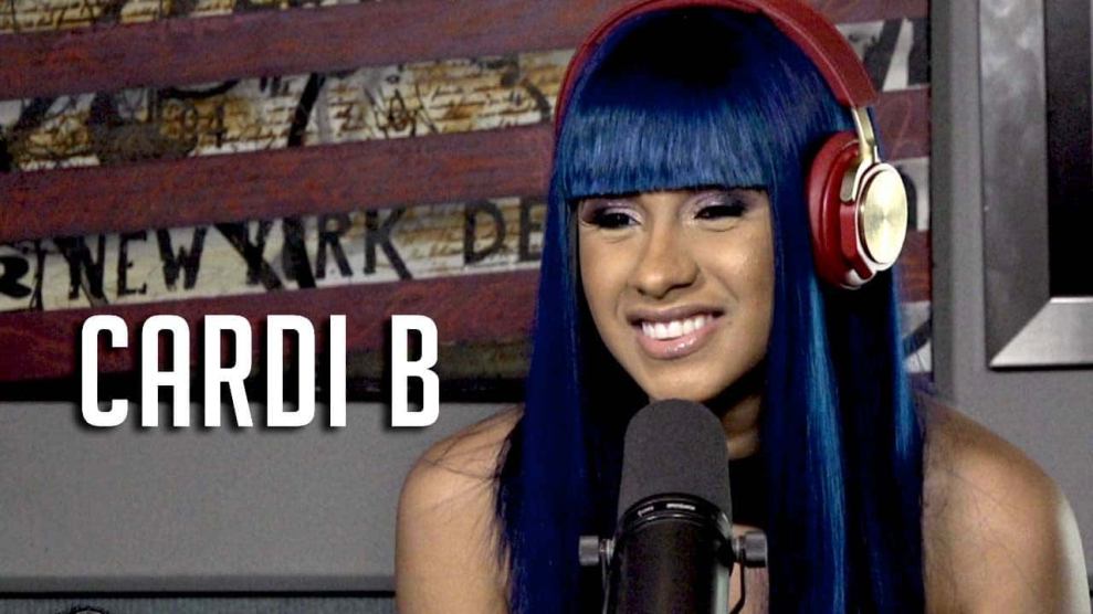 Cardi B in Hot 97 Studio with blue hair