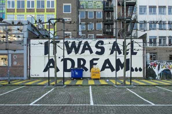 Hip-hop lyrics "It was all a dream"  based Graffiti on a wall near a parkinglot in Rotterdam.