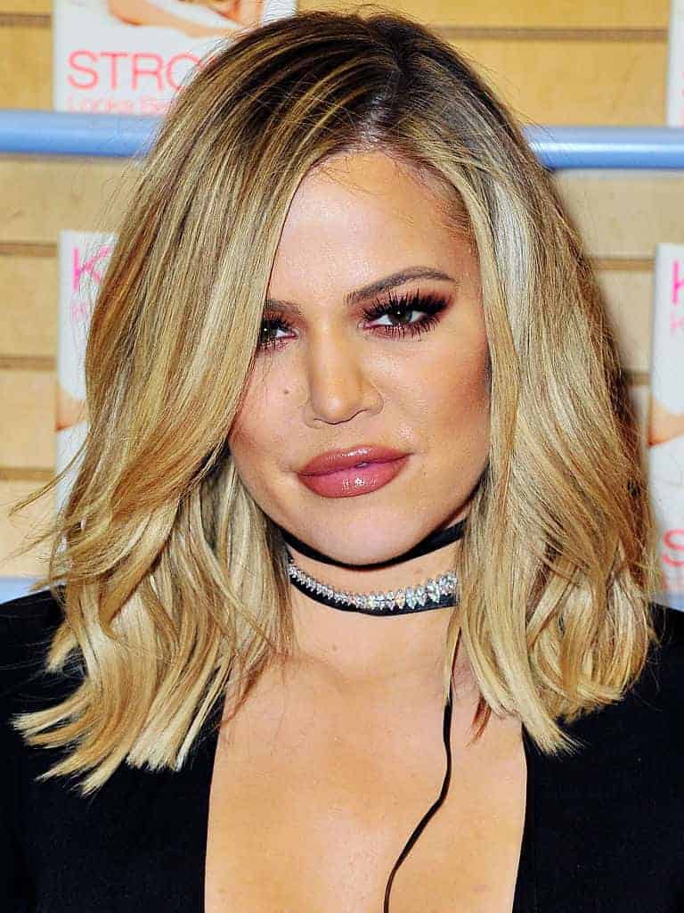 Khloe Kardashian attends Book Signing For 'Strong Looks Better Naked' November 13