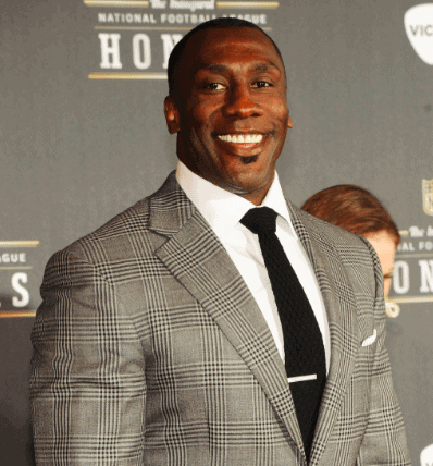 Shannon Sharpe arrives at the 2012 NFL Honors