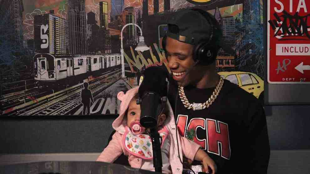 A Boogie Wit Da Hoodie in Hot 97 Studio with his young daughter