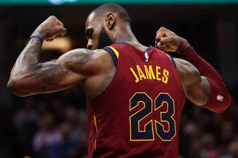 LeBron James #23 of the Cleveland Cavaliers flexes muscles after game