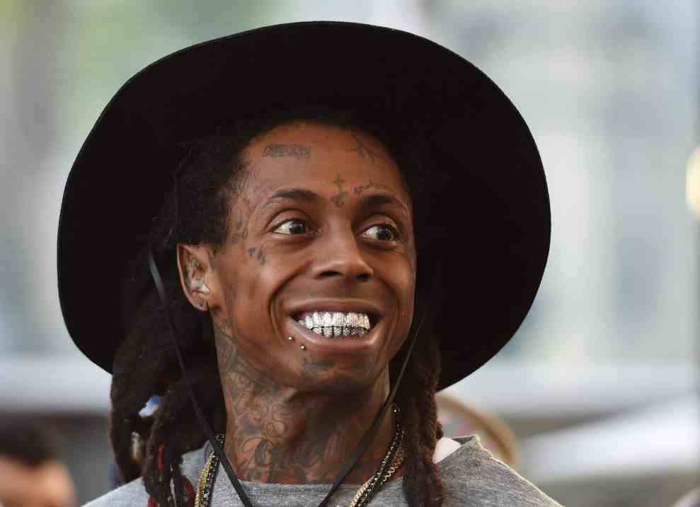 Lil Wayne smiles as he waits to perform at Foxtail Pool at SLS Las Vegas on September 6