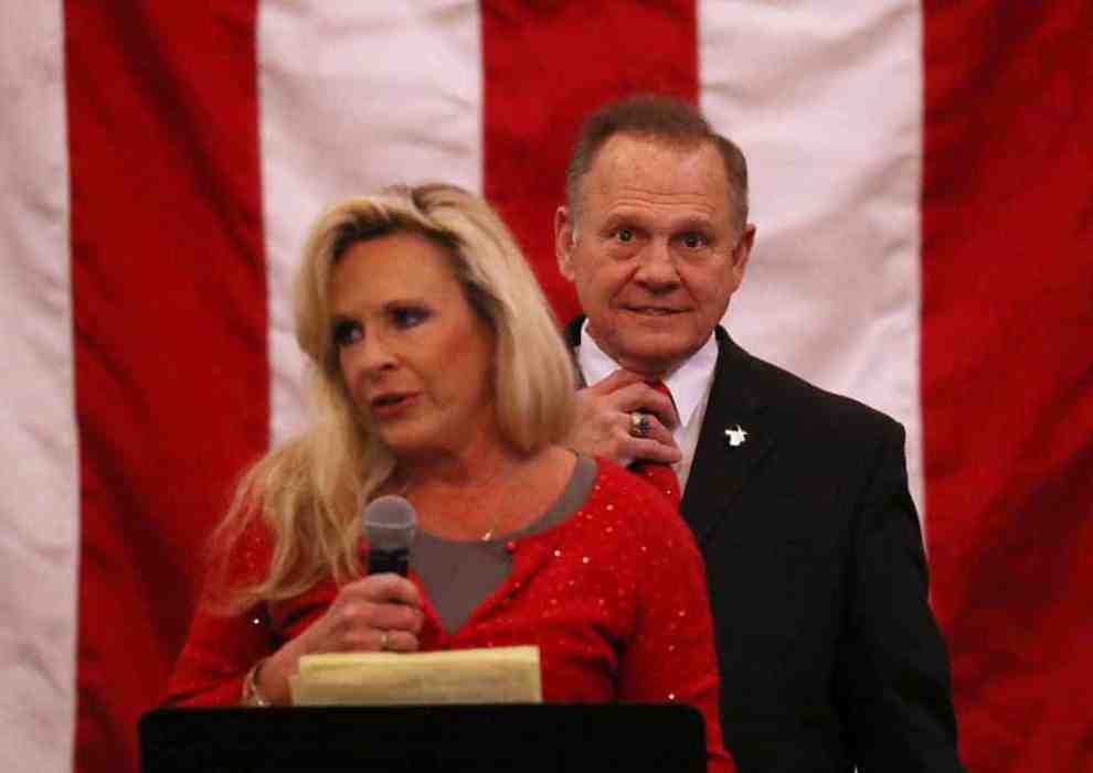 Kayla Moore stands in front of husband Roy Moore speaking at GOP Senate Candidate Judge Roy Moore Holds Rally On Eve Of Election