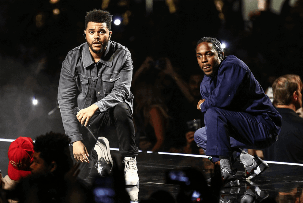 Kendrick Lamar joins The Weeknd on stage during the 'Legends of The Fall Tour' to perform 'Sidewalks' on April 29