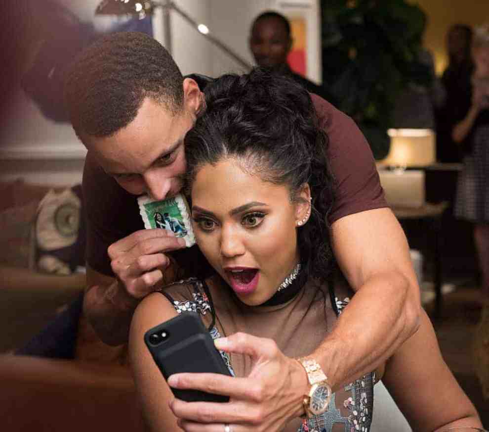 Stephen Curry and Ayesha Curry take a selfie the Williams-Sonoma Ayesha Curry Book Signing