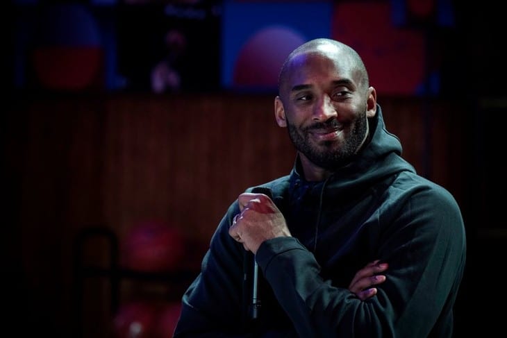 Kobe Bryant attends a Nike promotional event e improvements of a local basketball playground in Paris