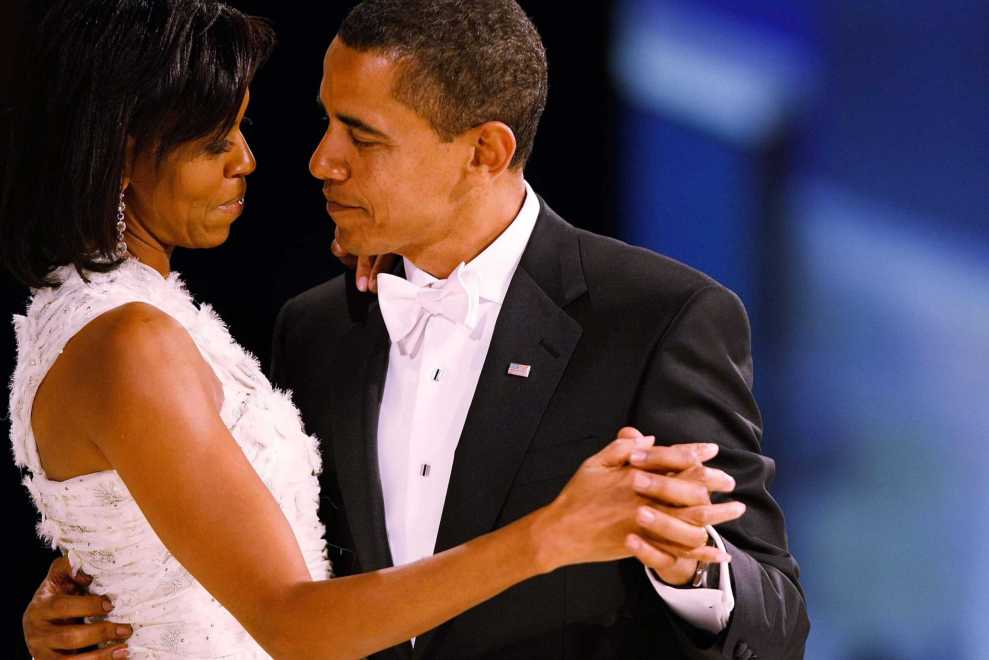 President Barack Obama dances with his wife and First Lady Michelle Obama during the Western Inaugural Ball on January 20