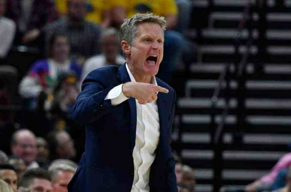 Steve Kerr of the Golden State Warriors yells to his team during a game