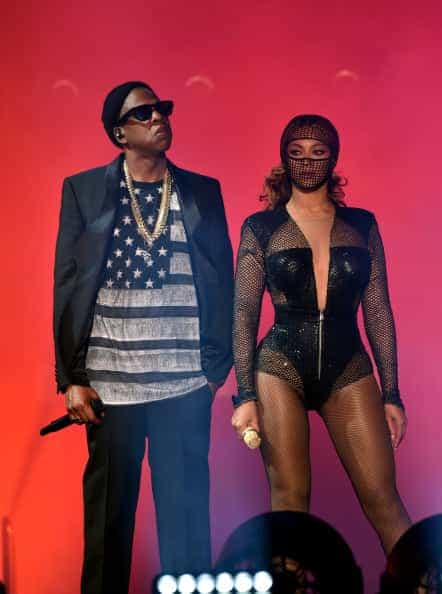 Jay Z and Beyoncé perform during the "On The Run Tour: Beyonce And Jay-Z" at the Rose Bowl on August 2