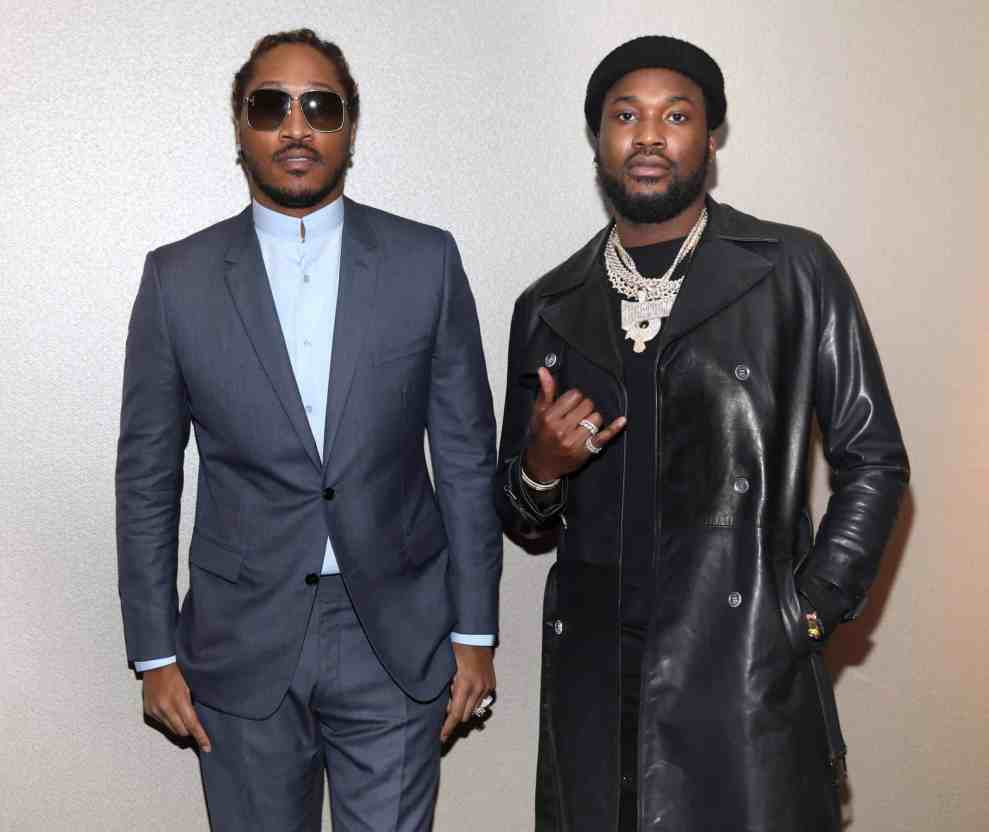 Future and Meek Mill standing against the wall