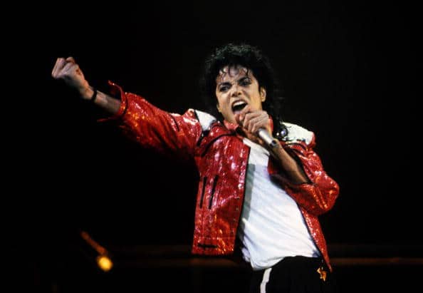 Michael Jackson performing in red leather jacket